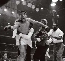  ?? Associated Press file photo ?? Muhammad Ali, then known as Cassius Clay, reacts after upsetting Sonny Liston on Feb. 25, 1964. The world had changed.
