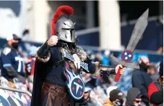  ?? AP Photo/Wade Payne ?? ■ A Tennessee Titans fan cheers in the second half Sunday in Nashville, Tenn.