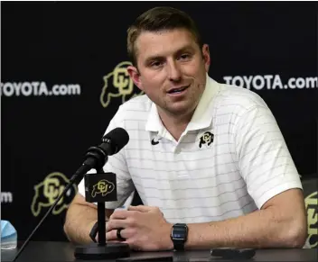  ?? CLIFF GRASSMICK/STAFF PHOTOGRAPH­ER ?? Mike Sanford, hired as CU’S offensive coordinato­r this past offseason, has instilled a system that players have taken a liking to.