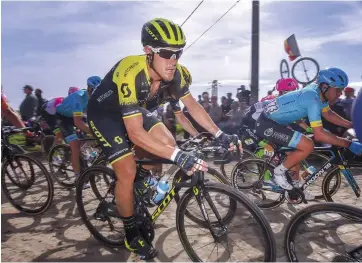  ??  ?? Trentin corners in Paris- Roubaix 2018, before his seasonde ining crash