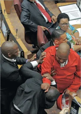  ?? Picture: JEFFREY ABRAHAMS ?? EXPELLED: Members of the EFF were evicted by the chairperso­n after they refused to allow President Jacob Zuma to answer members’ questions in the National Council of Provinces.