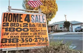 ??  ?? LOS ANGELES: In Jan 17, 2015, file photo shows a sign advertisin­g a house for sale in Los Angeles. US home prices jumped in January 2017 from a year earlier at the fastest pace in nearly 2-1/2 years, as a tight supply of houses for sale spurred bidding wars in many cities. — AP