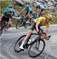  ?? (Reuters) ?? TEAM SKY rider and yellow jersey Chris Froome of Britain stays ahead after yesterday’s Alpine ride.