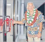  ?? Picture: REINAL CHAND ?? Bill Gibson cuts the ribbon to officially open the new Gibson Freight warehouse in Nasoso, Nadi.