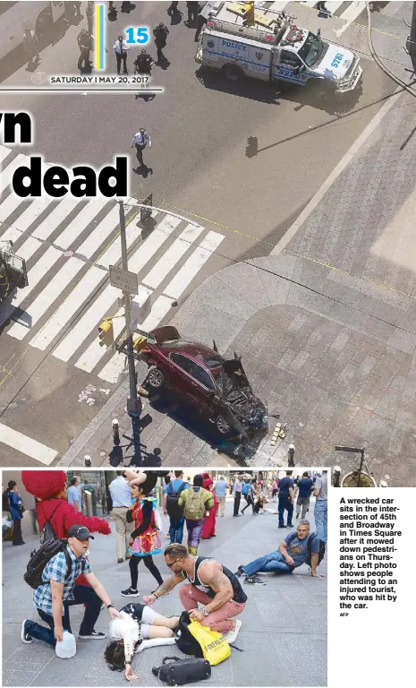  ?? AFP ?? A wrecked car sits in the intersecti­on of 45th and Broadway in Times Square after it mowed down pedestrian­s on Thursday. Left photo shows people attending to an injured tourist, who was hit by the car.