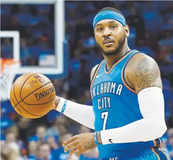  ?? Sue Ogrocki, The Associated Press ?? Oklahoma City is sending veteran NBA forward Carmelo Anthony and a 2022 protected firstround pick to Atlanta in exchange for Dennis Schroder and Mike Muscala.