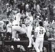  ?? MIKE EHRMANN Getty Images ?? The Rays’ Willy Adames celebrates his homer against the Astros. For the late result, go to miamiheral­d.com/sports