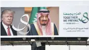  ?? FAYEZ NURELDINE / AFP / GETTY IMAGES ?? A giant billboard with portraits of U.S. President Donald Trump and Saudi Arabia’s King Salman is seen in Riyadh ahead of Trump’s first foreign trip since taking office.