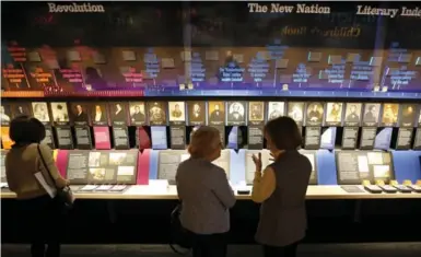  ?? CHARLES REX ARBOGAST/THE ASSOCIATED PRESS ?? The American Writers Museum features a timeline display that celebrates authors who are emblematic of “American Voices.”