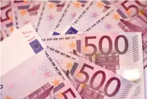  ??  ?? SEVERAL €500 notes displayed in this illustrati­on picture taken on Feb. 12, 2016 in Paris.