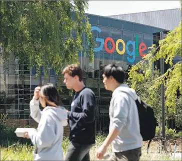  ?? Amy Osborne AFP/Getty Images ?? GOOGLE WORKERS have petitioned the company to afford more rights to contracted workers, reform its AI ethics board and stop developing a censored search engine for China. The protests have had some effect.