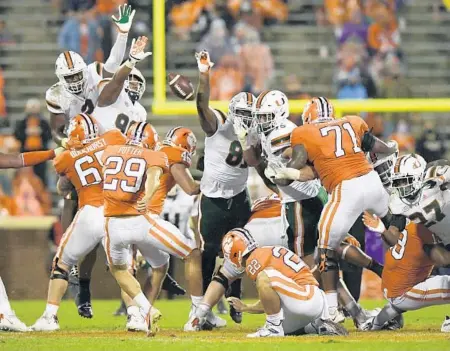  ?? BART BOATWRIGHT/THE CLEMSON INSIDER ?? Miami blocks a 61-yard field goal attempt by Clemson kicker B.T. Potter during their game on Oct. 10.