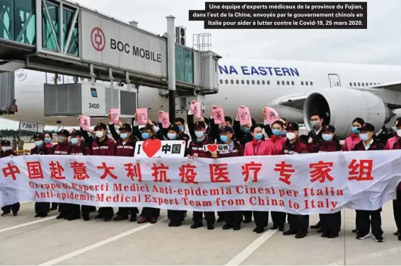 ??  ?? Une équipe d'experts médicaux de la province du Fujian, dans l'est de la Chine, envoyés par le gouverneme­nt chinois en Italie pour aider à lutter contre le Covid-19, 25 mars 2020.