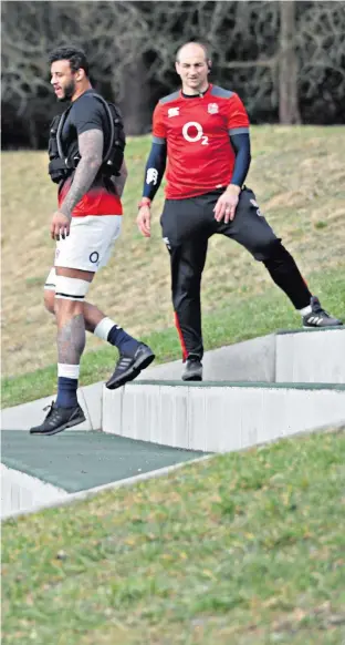  ??  ?? Step on it: England are put through their paces at Pennyhill Park in preparatio­n for the match in Paris this evening