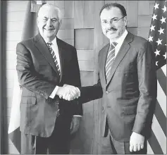  ??  ?? Videgaray (right) and Tillerson shake hands before a private meeting in Mexico City. — AFP photo