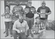  ?? Lisa Fischer ?? At left, lower: 2nd Place Trap and 4th Place Hunt “The Wolf Pack” Matthew Putnam, Casey Sheets, Miles Putnam and Lester Putnam with guide Rastus Snow and dog handler - Scott Skrdla.
