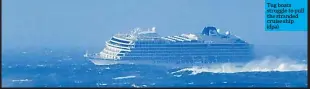  ?? (dpa) ?? Tug boats struggle to pull the stranded cruise ship