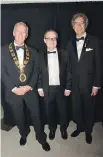  ??  ?? St. Patrick’s Society president Scott Phelan, new Irish ambassador to Canada Jim Kelly, and borough mayor Russell Copeman, representi­ng Denis Coderre, unite for a photo.
