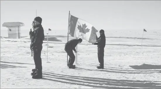  ?? The Canadian Press/national Science Foundation/blaise Kuo Tiong ?? A memorial ceremony is held for the Kenn Borek aircrew who died in last week’s crash in Antarctica, at the National Science Foundation’s Amundsen-Scott South Pole Station.