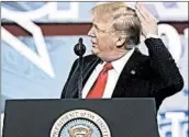  ?? SAUL LOEB/GETTY-AFP ?? President Donald Trump jokes about his bald spot during his speech Friday to the CPAC audience in Oxon Hill, Md.