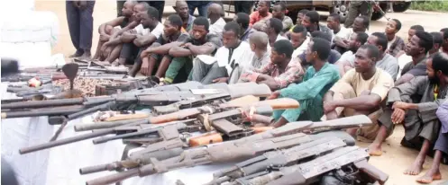  ?? Photo: Shehu K. Goro ?? Some of the 79 suspected kidnappers being paraded by the police at the Rijana Police Station, along the Kaduna-Abuja highway yesterday