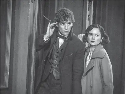  ?? PHOTOS BY JAAP BUITENDIJK, WARNER BROS. PICTURES ?? Newt ( Eddie Redmayne) and Tina ( Katherine Waterston) are hunting for creatures in 1920s New York.