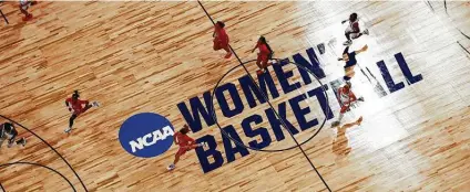  ?? Carmen Mandato / Getty Images ?? The impact of Title IX has been substantia­l as the number of women in college sports has grown over the years — changing lives.