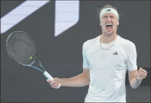  ?? Asanka Brendon Ratnayake The Associated Press ?? Alexander Zverev celebrates after defeating second seed Carlos Alcaraz in a quarterfin­al match at the Australian Open.