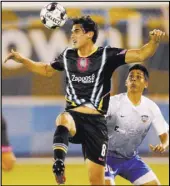  ??  ?? Lights FC forward Omar Salgado delivers a header in front of Rio Grande Valley FC Toros defender Omar Ontiveros.
