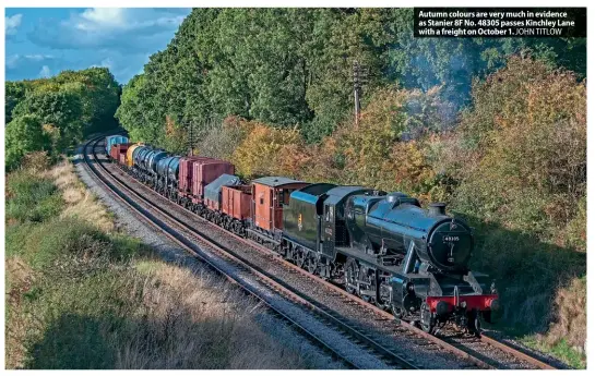  ?? JOHN TITLOW ?? Autumn colours are very much in evidence as Stanier 8F No. 48305 passes Kinchley Lane with a freight on October 1.