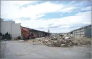  ?? TANIA BARRICKLO — DAILY FREEMAN FILE ?? APRIL 22: Demolition work nears completion in the project to transform the former Macy’s store at Hudson Valley Mall in the town of Ulster into a multi-discipline medical complex.