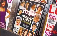  ?? (Shannon Stapleton/Reuters) ?? A COMMEMORAT­IVE ISSUE of ‘People’ magazine is seen on a newsstand in New York, in 2010.