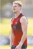  ??  ?? BIG CHANCE: Michael Hurley at Essendon training yesterday.