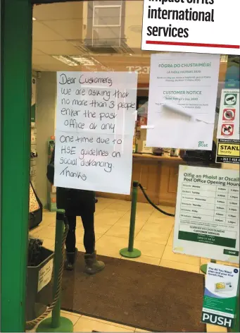  ??  ?? Sign erected at the post office on Castle Street, Sligo, limiting entry to three people at a time.