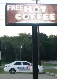  ?? Staff photo by Neil Abeles ?? ■ For eight coffee drinkers, Red River Pharmacy has become a hot meeting place.