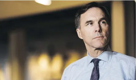  ?? CHRISTOPHE­R KATSAROV/THE CANADIAN PRESS ?? Economists have advised Finance Minister Bill Morneau to focus on reducing deficits to prepare for a slowdown in growth and amid worries over NAFTA and U.S. tax cuts.