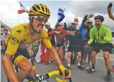  ?? AP PHOTO/ CHRISTOPHE ENA ?? French cyclist Julian Alaphilipp­e climbs the Galibier pass in the Alps on Thursday during the 18th stage of the Tour de France. Alaphillip­e remained the race’s overall leader, though he lost time after Egan Bernal attacked to move into second place.