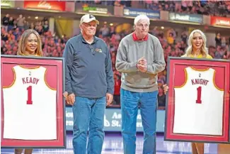  ?? AP PHOTO/MICHAEL CONROY ?? Former Purdue men’s basketball coach Gene Keady, left, and former Indiana coach Bob Knight are honored at halftime of an NBA game between the Indiana Pacers and the New Orleans Pelicans on Saturday in Indianapol­is.