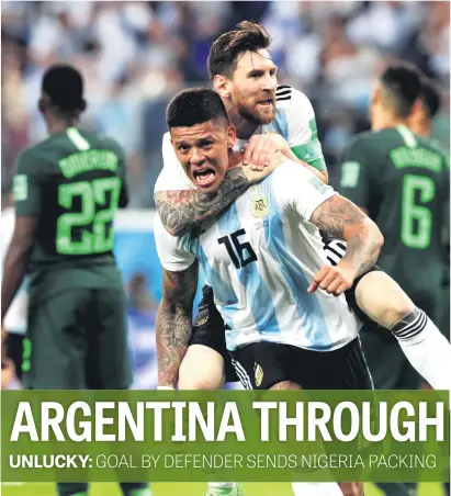  ?? Picture: Reuters ?? PIGGYBACKI­NG. Argentina’s Marcos Rojo celebrates scoring their winning goal with Lionel Messi at the St Petersburg Stadium last night. They beat Nigeria 2-1.