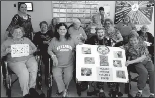  ?? Submitted photo ?? BIRD WATCHERS: Residents of Village Springs Nursing and Rehab Center gather Monday to tabulate their results from their participat­ion in the 14th annual Great Backyard Bird Count last weekend. About 20 residents took time beginning Friday through...