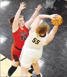  ??  ?? Pea Ridge senior Hayley West, No. 42, contests an outlet pass after Prairie Grove 6’0” senior Olivia Kestner controlled a defensive rebound. West scored 8 points in the Lady Blackhawks’ 65-38 win in 4A-1 Conference girls basketball action at Tiger arena Tuesday, Feb. 9.