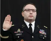  ?? PHOTOS BY ANDREW HARNIK — THE ASSOCIATED PRESS ?? National Security Council aide Lt. Col. Alexander Vindman testified before the House Intelligen­ce Committee in November. He was reassigned to the Army on Friday.