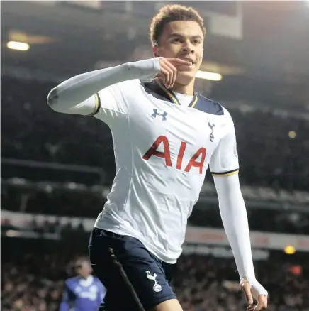  ??  ?? DOUBLE TROUBLE: Tottenham Hotspur’s Dele Alli celebrates scoring a goal during their English Premier League match against log-leaders Chelsea at White Hart Lane on Wednesday. Spurs won 2-0, with Alli grabbing a stunning second that took his goal tally...