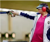  ??  ?? Malaika Goel en route to her silver medal in the women’s 10m air pistol event on Friday.