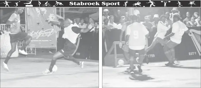  ??  ?? Stellon David (left) of Bent Street attempting a tackle on Wendell Austin (right) of Camp Street All-Stars at the Demerara Park in the Guinness ‘Greatest of the Streets’ Football Championsh­ip Man in the Middle-Jermin Junior (centre) of North East La...