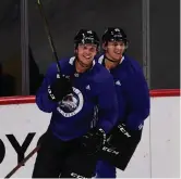  ?? Hyoung Chang, The Denver Post ?? Avalanche forwards Mikko Rantanen, left, and Andre Burakovsky work out during phase 3 training camp at Pepsi Center on Tuesday.