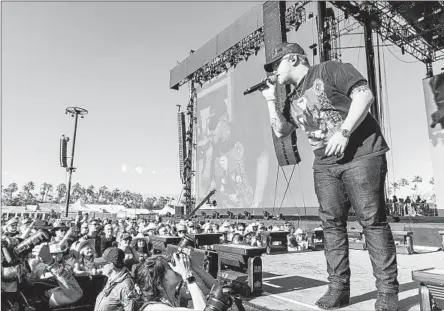  ?? Evan Schaben For The Times ?? ERNEST PERFORMS April 27 on the Mane Stage on the second day of the Stagecoach country music festival in Indio. Of his latest LP, “Nashville, Tennessee,” the singer-songwriter says: “I want this album to live beyond just being a hot, sizzling record right now.”