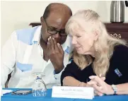  ?? PHOTO BY JANET SILVERA ?? Minister of Tourism Edmund Bartlett having a quiet word with president of the FCCA Michele Paige.