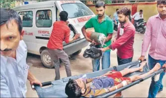  ?? PTI FILE ?? A child being shifted to another ward at Baba Raghav Das Medical College Hospital in Gorakhpur district.
