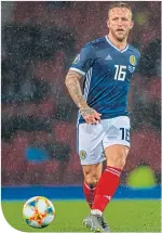  ??  ?? Johnny Russell in action for Scotland